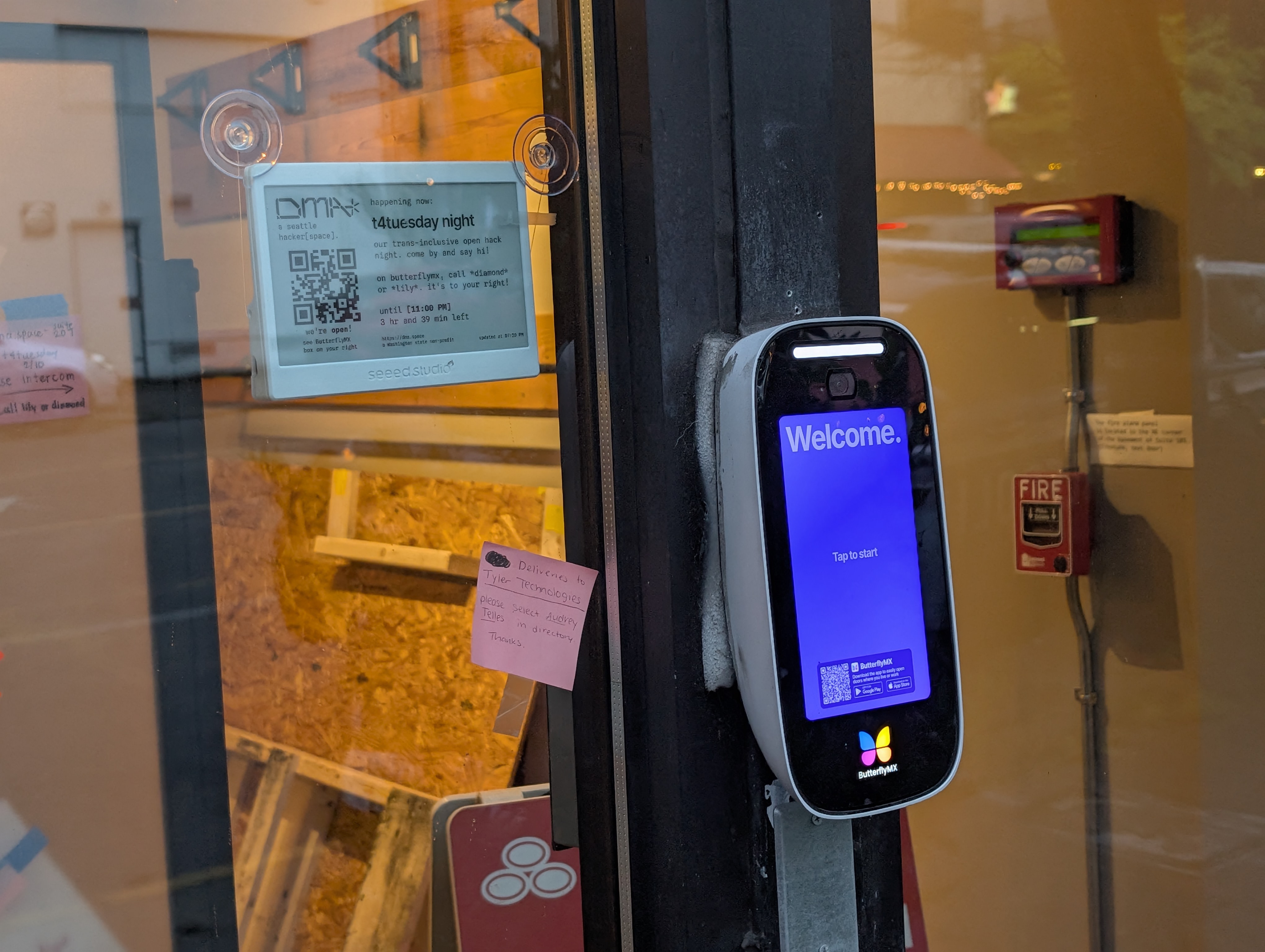 the eink sign seen from outside, next to the ButterflyMX box